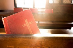 The old red books or red worship songbooks in church